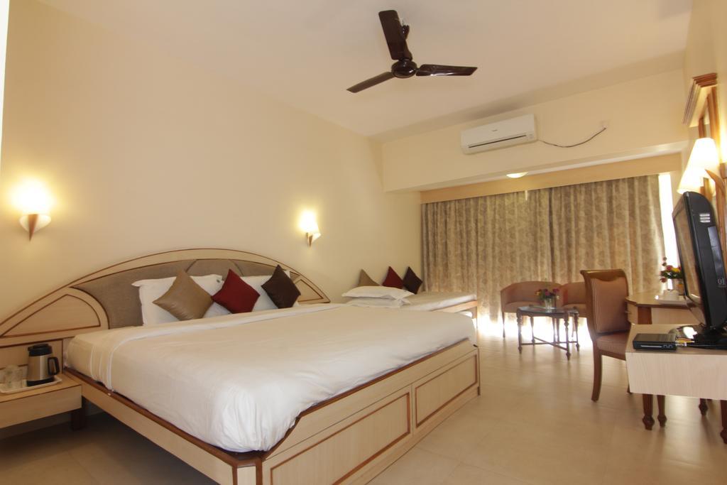 Aveda Blue Country Resort Panchgani Rum bild