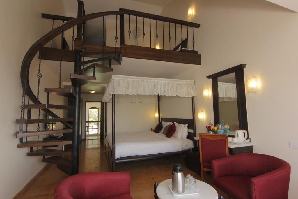 Aveda Blue Country Resort Panchgani Rum bild